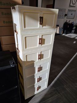 Plastic Stackable Storage Cabinet with Doors. brand new in box