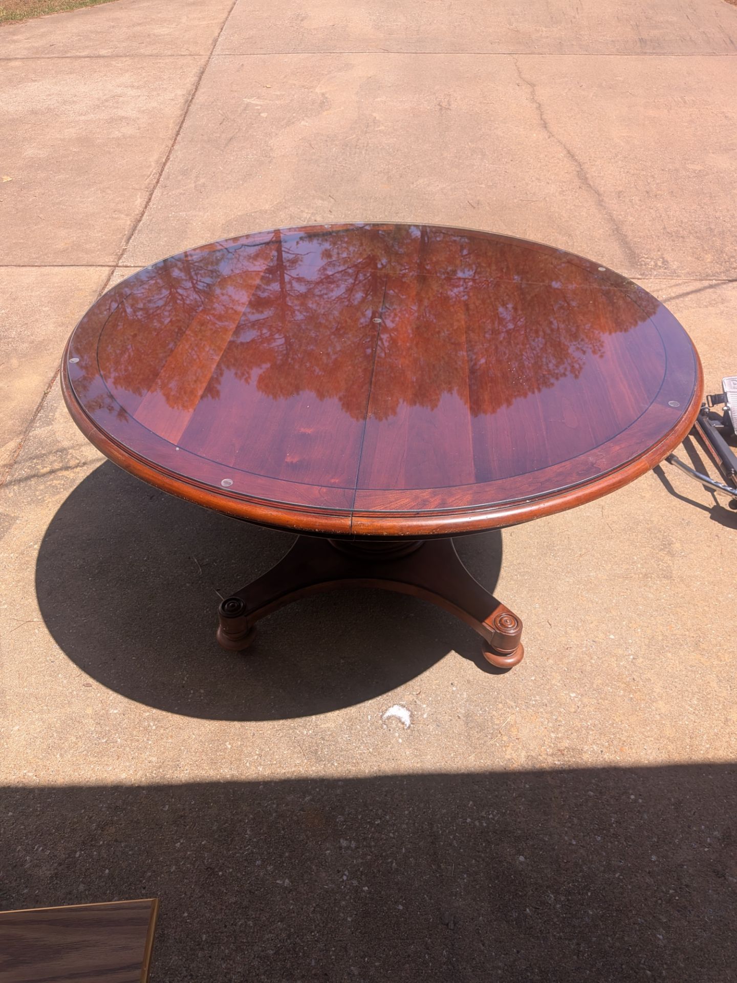 Vintage Mahogany Pedestal Dining Table with Glass Top and Leaf.