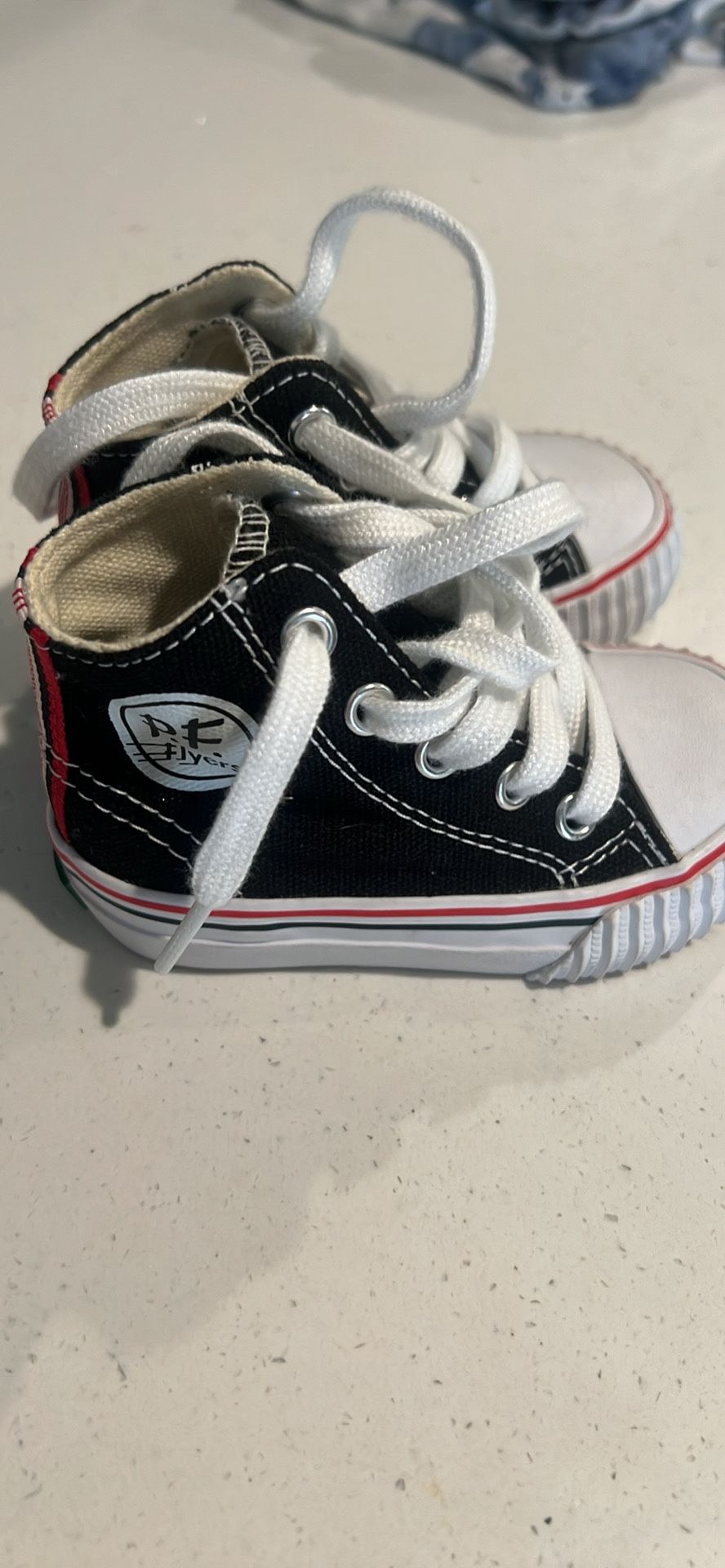 Toddler size 4, Converse. New never worn.