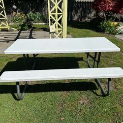Lifetime Picnic table with attached benches.