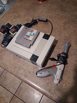 Nintendo NES system with all hookups and one game all tested all work very clean $100