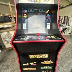 Arcade1Up Pac-Man arcade machine with riser and seat cover