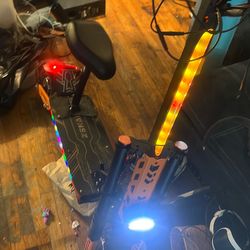 Electric scooter with seat