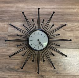 Sterling And Noble Starburst Clock