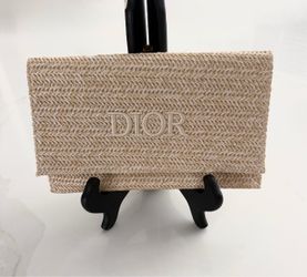 Raffia clutch bag