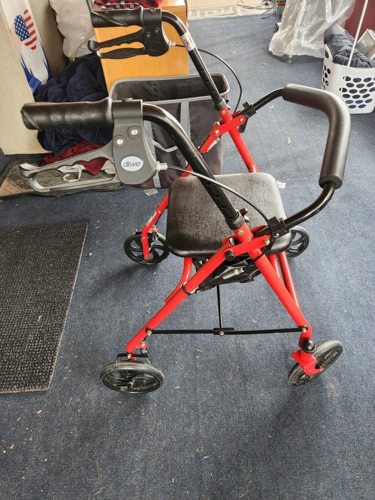 Red Walker,brakes, Adjustable,seat storage Like New