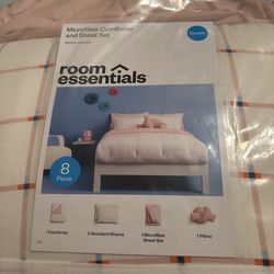 New 8 pc. Queen comforter set . Pink plaid Room Essentials