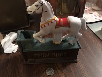 Reproduction cast iron trick pony coin bank