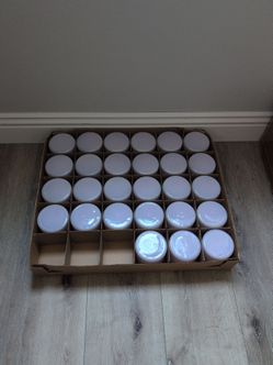 Light lavender glass candle jars.