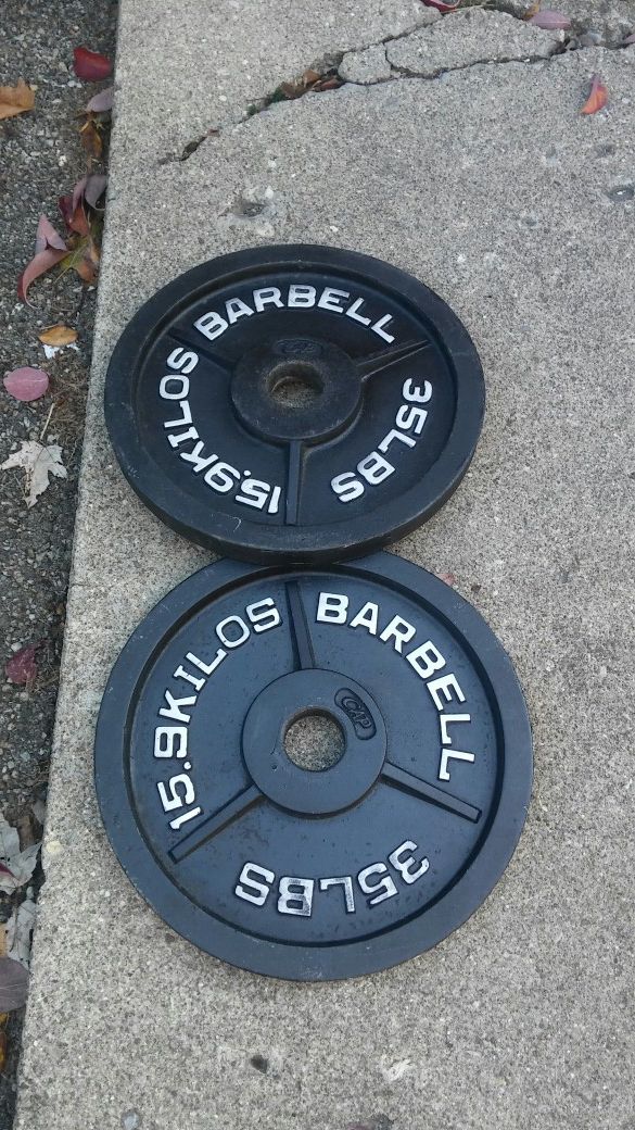 35 POUND OLYMPIC WEIGHT PLATES