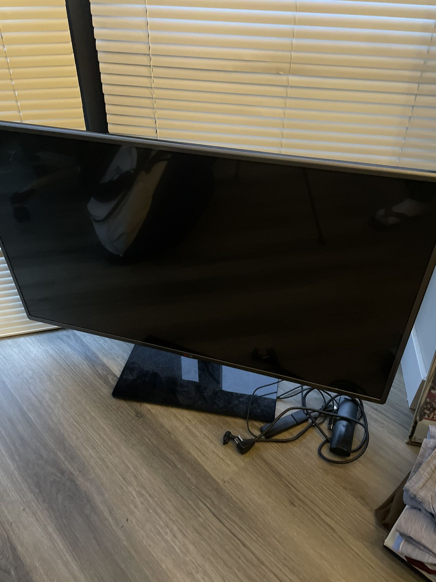 40” LG TV WITH STAND and ROKU