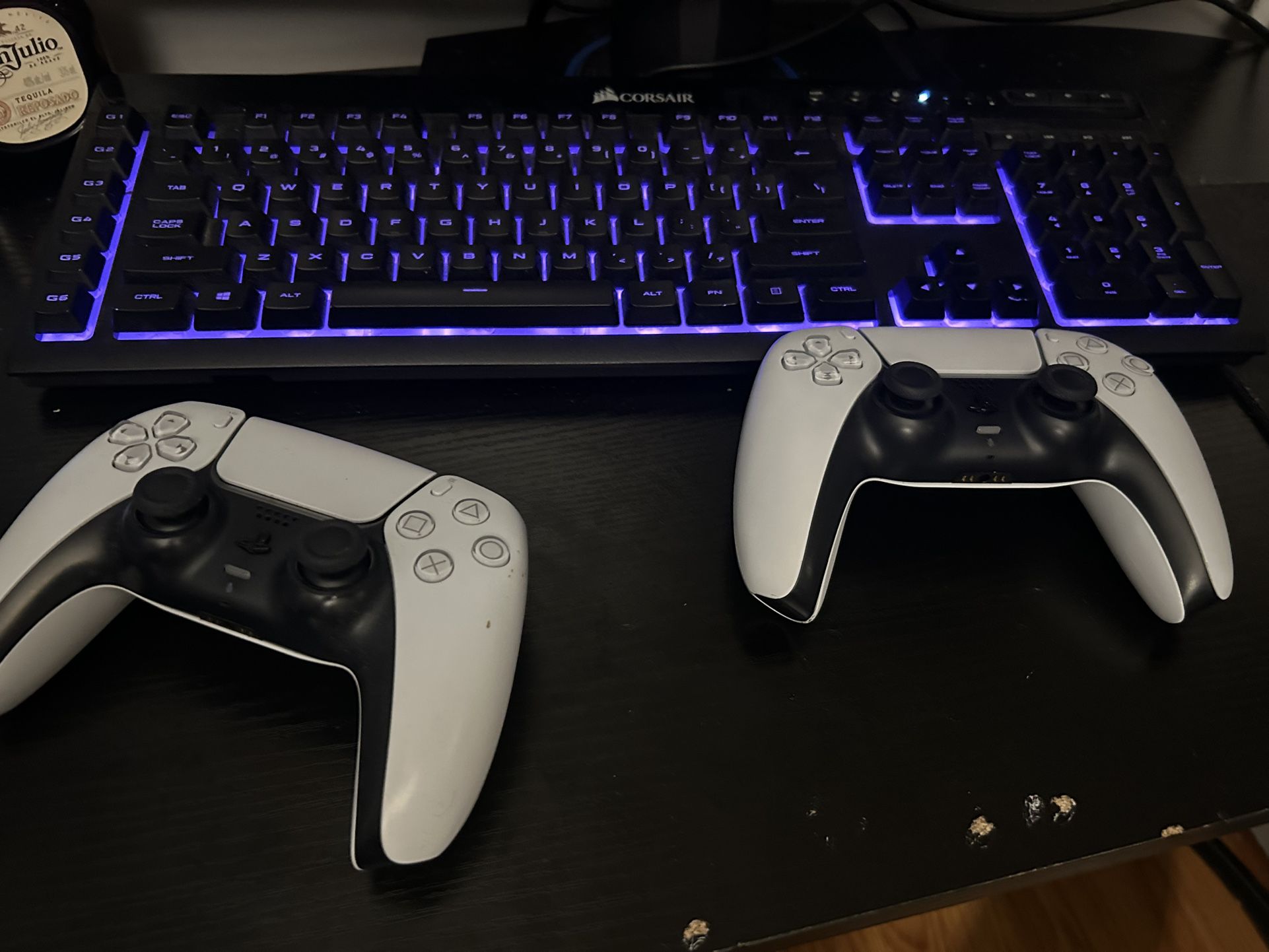 disc playstation 5 with 2 half broken controllers