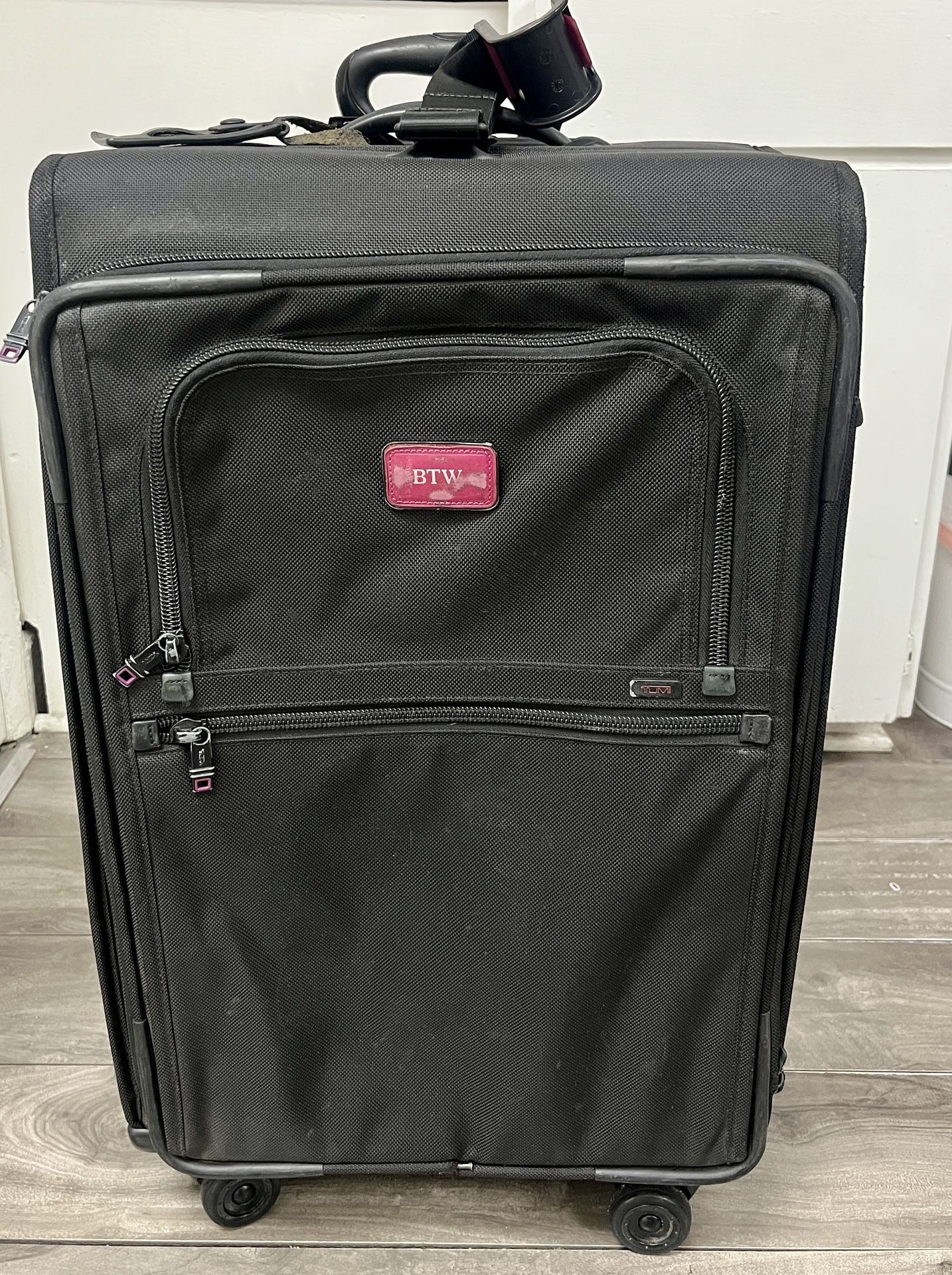 Tumi 26-Inch Rolling Four Wheel Suitcase, Black