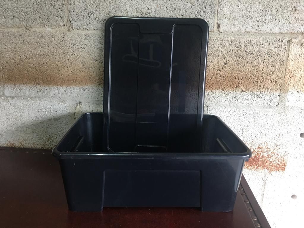 4 Ikea plastic containers with lids all in black