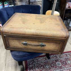 Trunk with a drawer