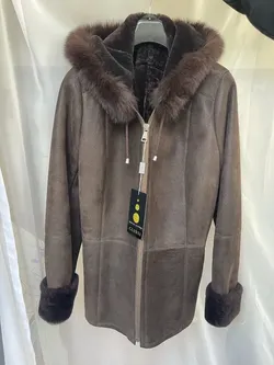 Natural brown womens sheepskin coat with a hood, warm