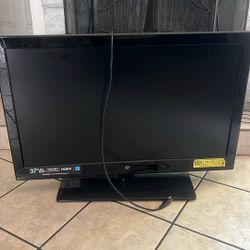 FLAT SCREEN TV with Roku streaming Device