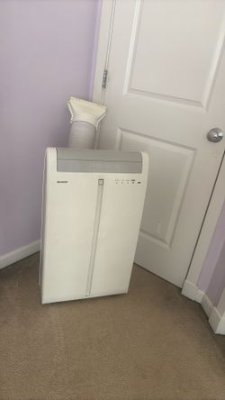 Sharp portable air conditioner with remote