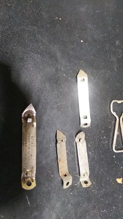 5 antique bottle openers