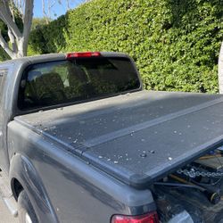 Bed Cover, Folder Nissan Frontier. 5 Feet, reinforced