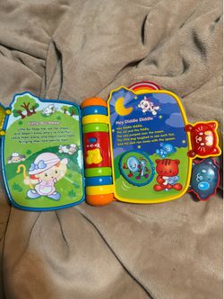 This is a VTech Rhyme & Discover Book featuring a "BINGO" song page.