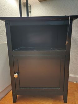 Dark wood nightstand