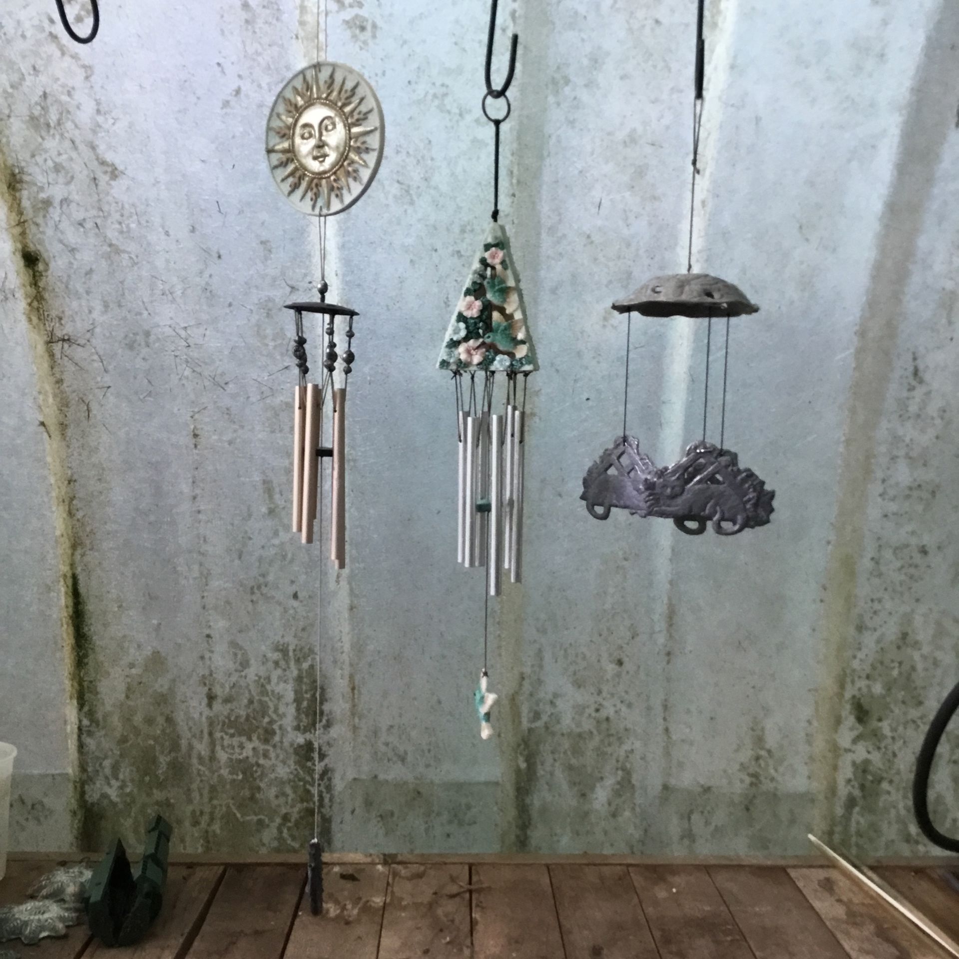 Three Nice Wind Chimes - $5 Each - Sun Measures Approximately 30”  Hummingbird Approximately 20”  Pewter Kitty Cats Approximately 13”