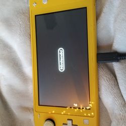 Nintendo Switch Lite, W/Gaming Card, Case, And 2 Controllers