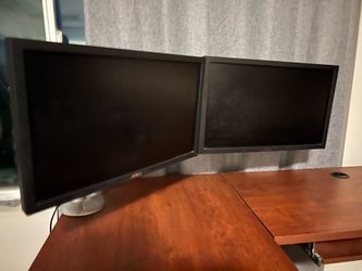 Dual dell monitors with arm to clamp
