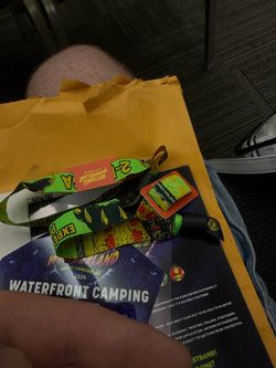 2 wristbands and a Waterfront camping pass