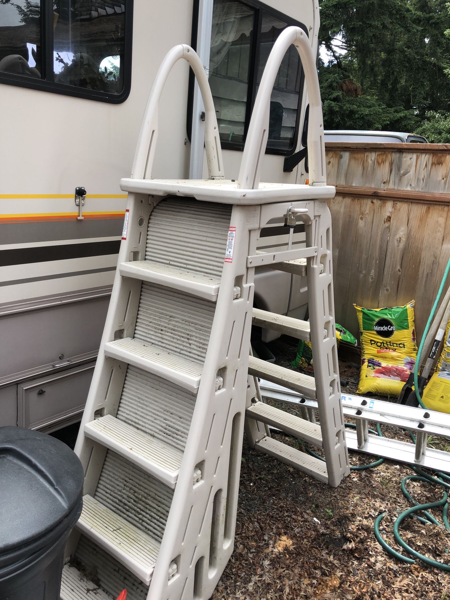 Heavy duty pool ladder with child guard