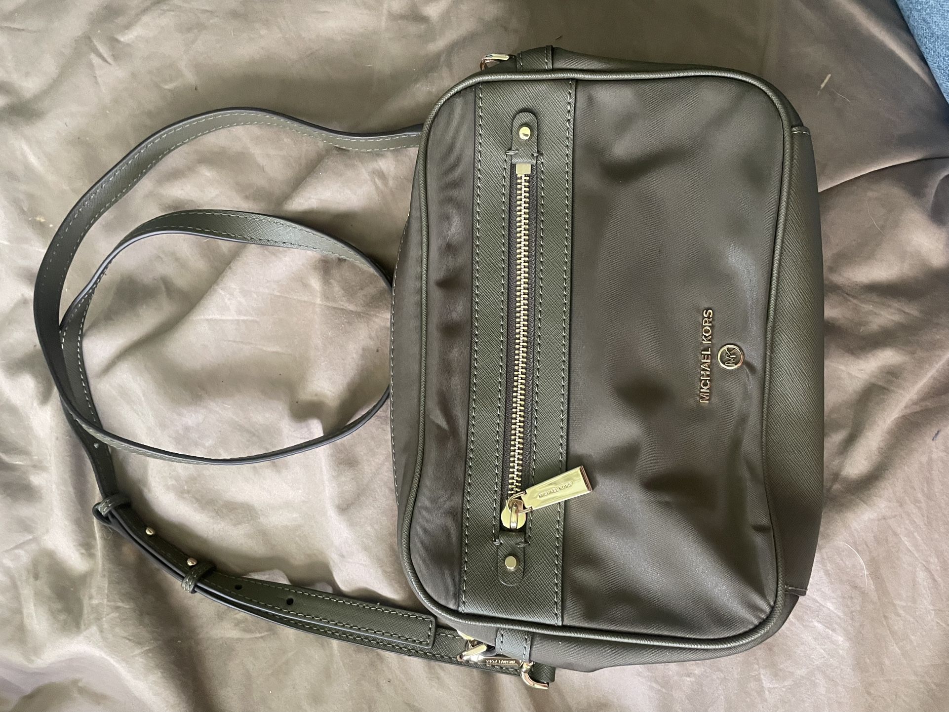 Michael Kors Crossbody purse and perfect condition. Looks brand new.