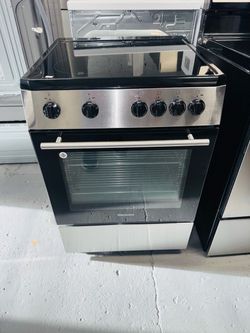 Blomberg 24-inch wide electric stove; includes a receipt for a 60-day warranty.