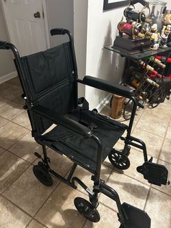 Wheelchair- Drive Medical Lightweight 16” Seat Width Transport Wheelchair w/ Fold down back + Footrests
