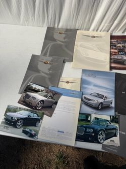 Chrysler and Plymouth dealership brochures from the 1980s to 2000s