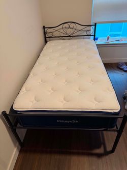 Twin Mattress with metal frame bed