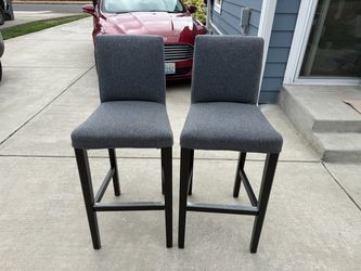 IKEA bar stool with a backrest.