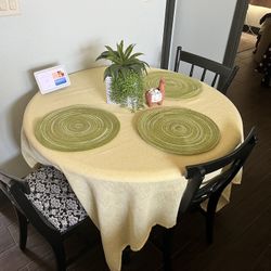 Wooden Table And Four Chairs