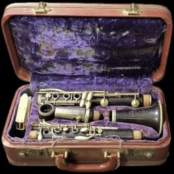 Vintage Normandy wood clarinet with case