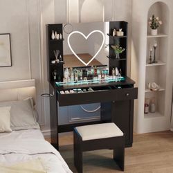 Vanity Black Desk with Mirror and Lights Heart Strip, RGB Led, Glass Top Bedroom Dresser with Rechargeable Outlet （Fcc） with Stool  New in box 