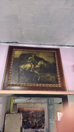 Man on horse painting