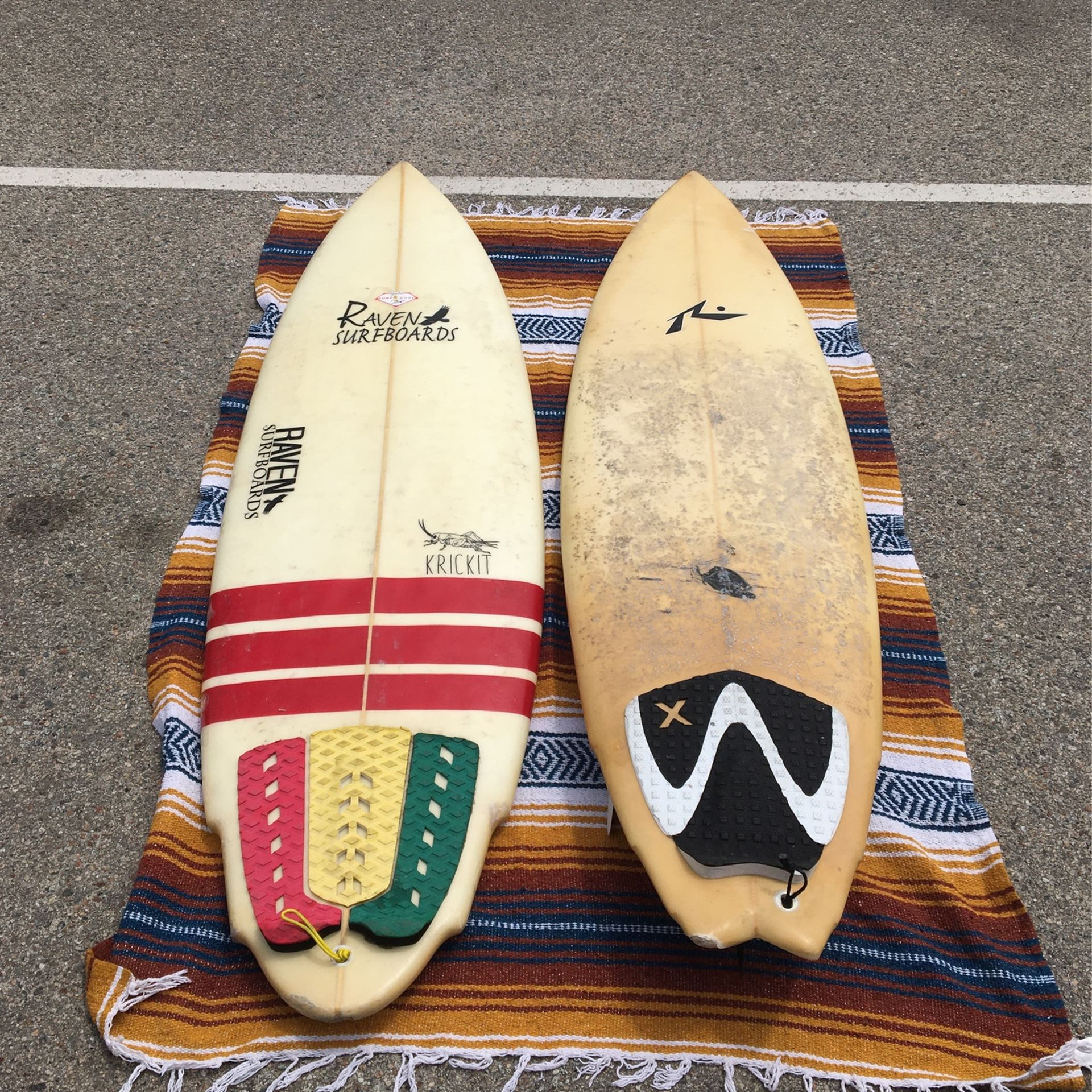 Two Surfboards One With Fins