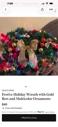 Festive Holiday Wreath with Gold Bow and Multicolor Ornaments