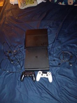 2 ps4s mint condition 2 pairs of cords and 2 controllers