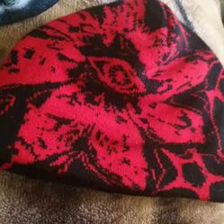 red and black beanie 
