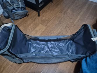 Baby changing station converts to a backpack