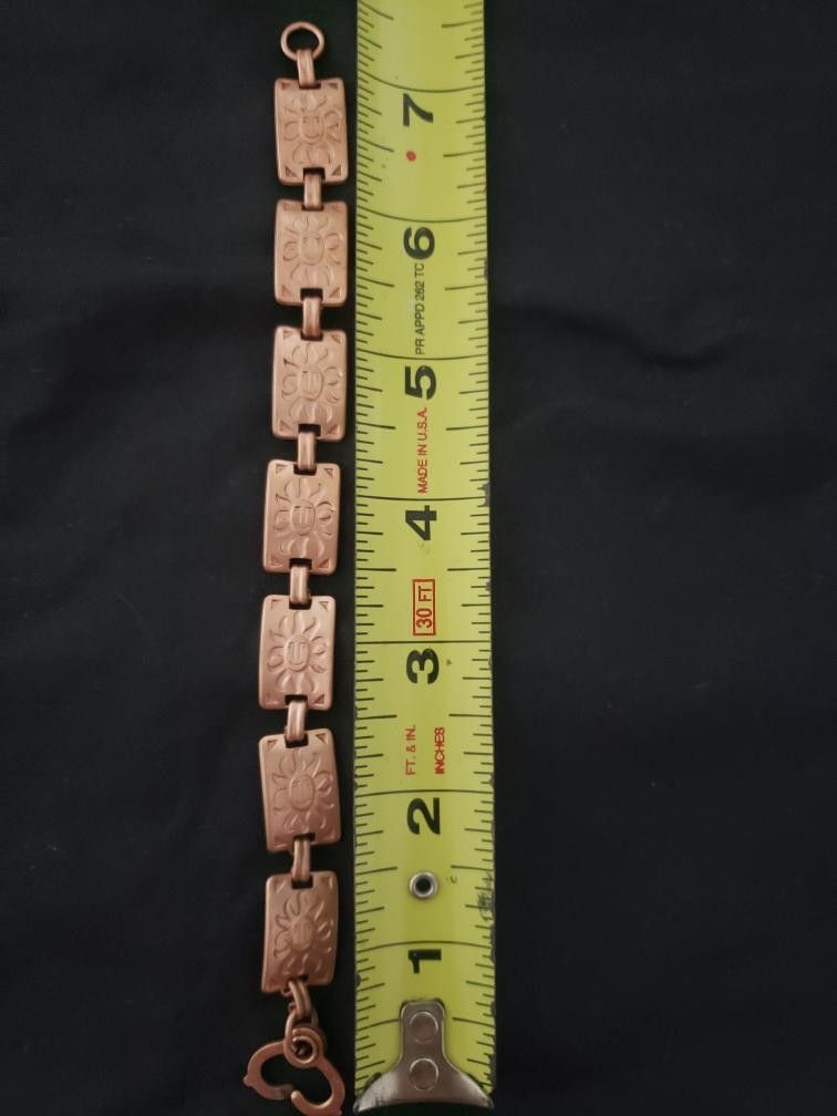 Solid COPPER bracelet. Good weight. Sun Face on each link.