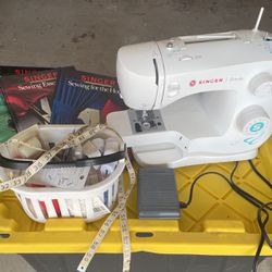Singer Simple Sewing Machine With Books And Sewing Items