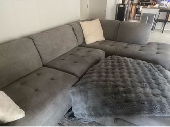 L-shaped Couch and Ottoman set.