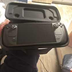 Steamdeck W/ case and charger. 256gb of additional storage